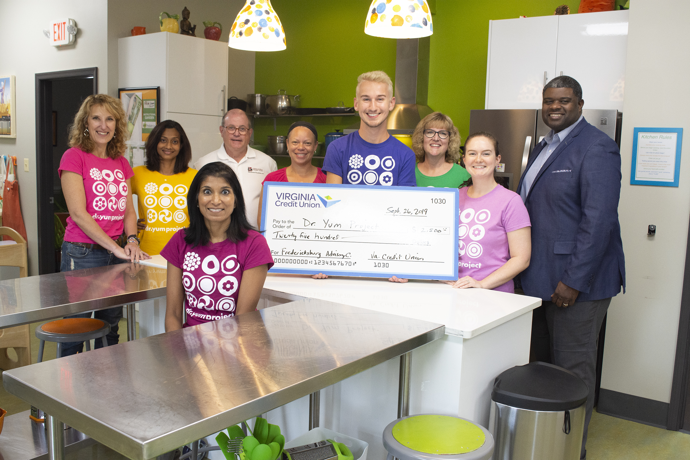 Members of the Fredericksburg Advisory Council for Virginia Credit Union along with Pediatrician Nimali Fernando (foreground) and volunteers with the Dr. Yum Project.