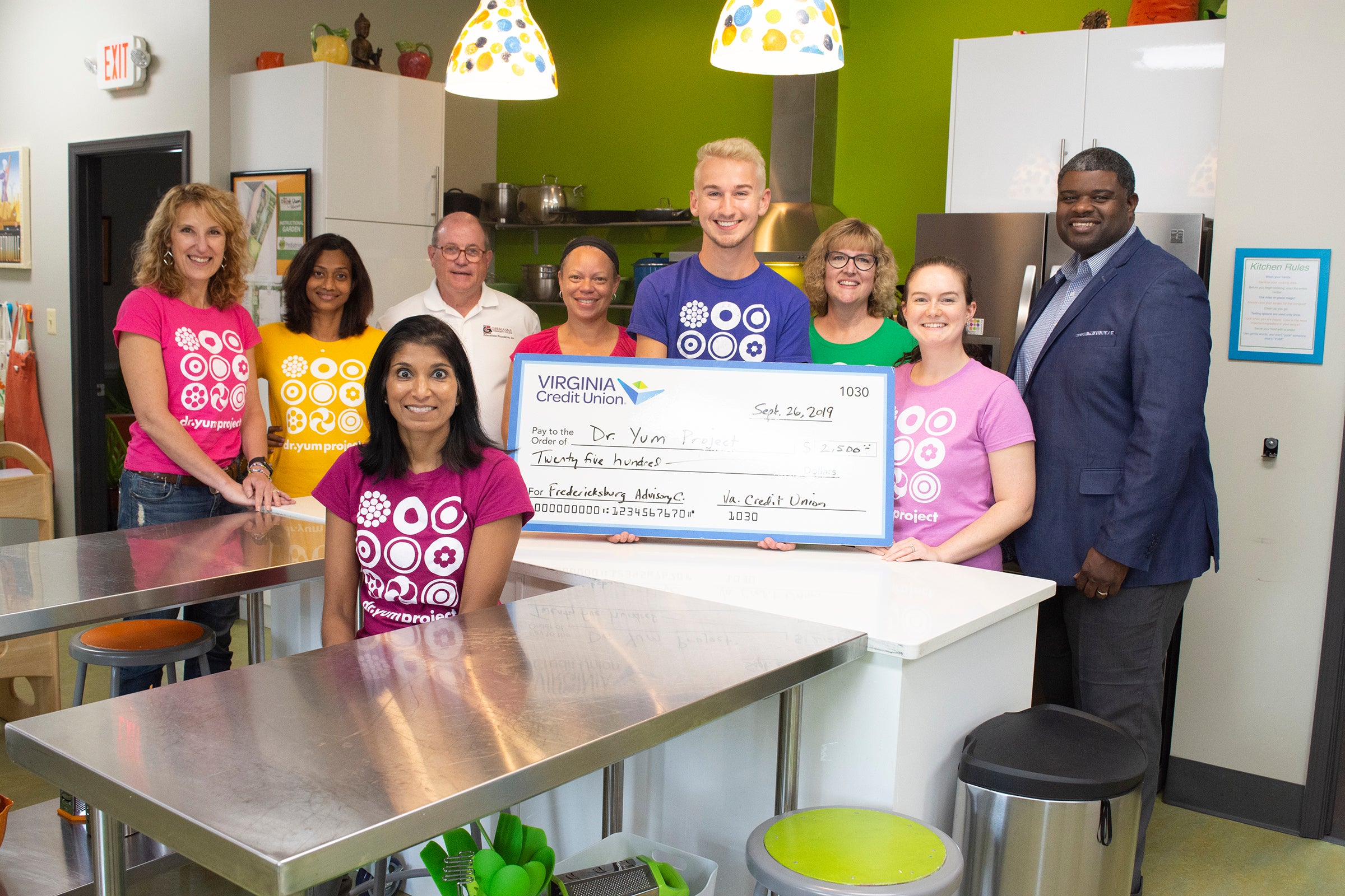 Members of the Fredericksburg Advisory Council for Virginia Credit Union along with Pediatrician Nimali Fernando (foreground) and volunteers with the Dr. Yum Project.