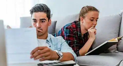 couple looking at finances