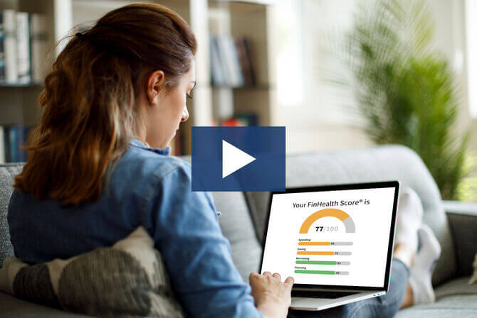 Woman using her laptop on a couch