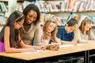 Teacher with middle school students