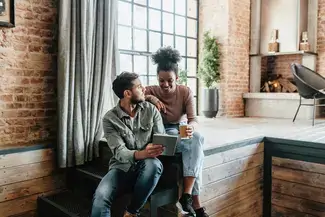 Couple looking over document together