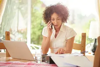 A young woman on the phone.