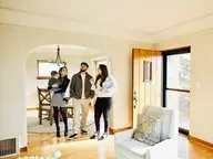 Family looking at their new home