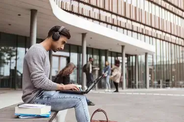 A student using a laptop