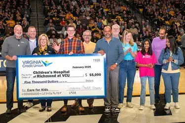 VACU presenting donation to Children's Hospital of Richmond at VCU basketball game
