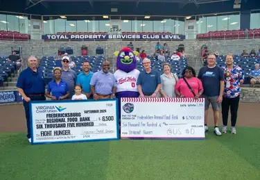 VACU and FredNats presenting donation to Fredericksburg Regional Food Bank at game