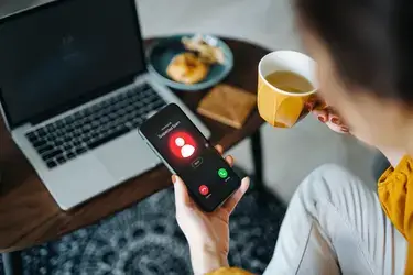 woman on phone and computer