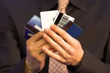 Hands holding a stack of cards