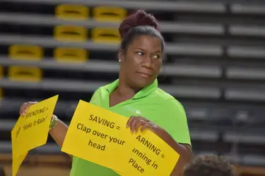 Staff from VACU provided a financial education lesson to students attending a youth basketball camp at VCU.