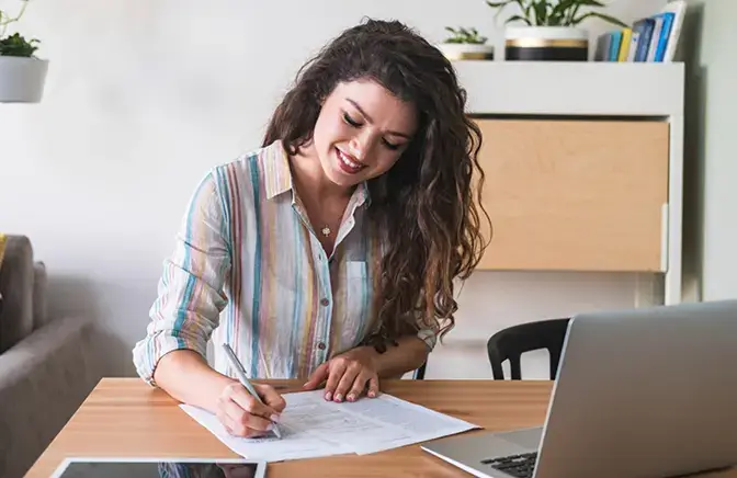 A woman working at her desk