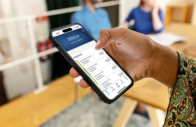 Person checking account on mobile banking app