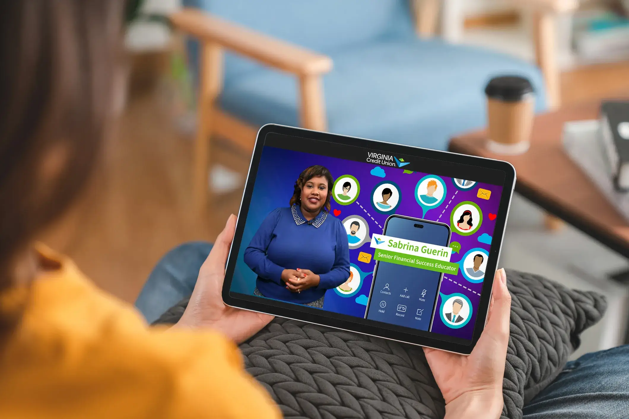 Person watching financial educational resource on a tablet device
